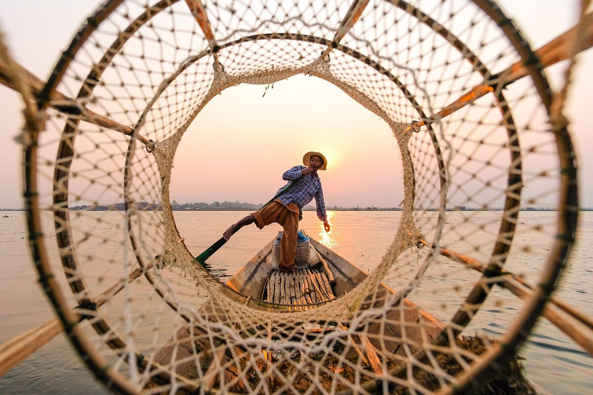 Leg-rowing fisherman on Inle Lake, Myanmar